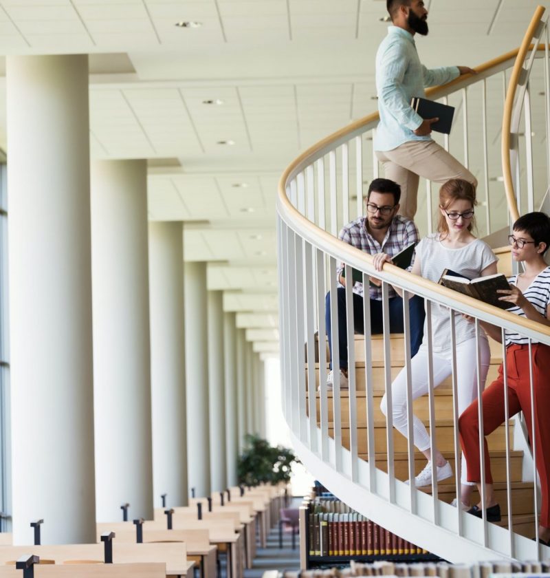 Group of students discussing in university